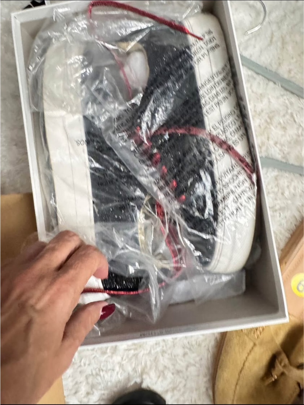 Black and White Low-Top Lace-Up Sneakers with Red Accents